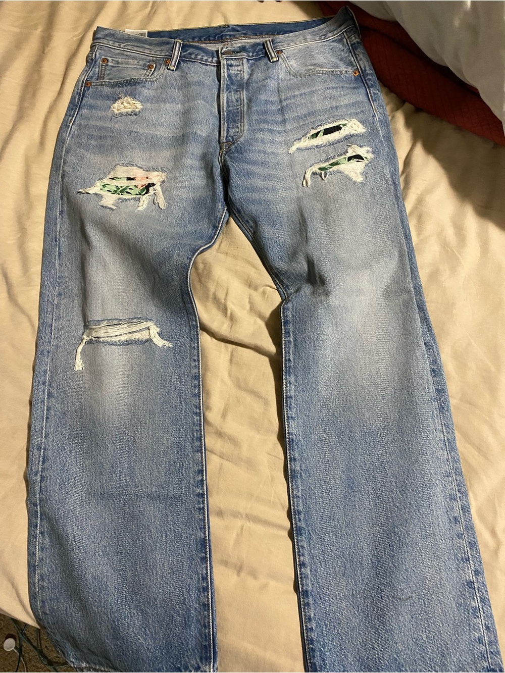 Levi's Light Blue Distressed Relaxed Fit Jeans with Patch Detail